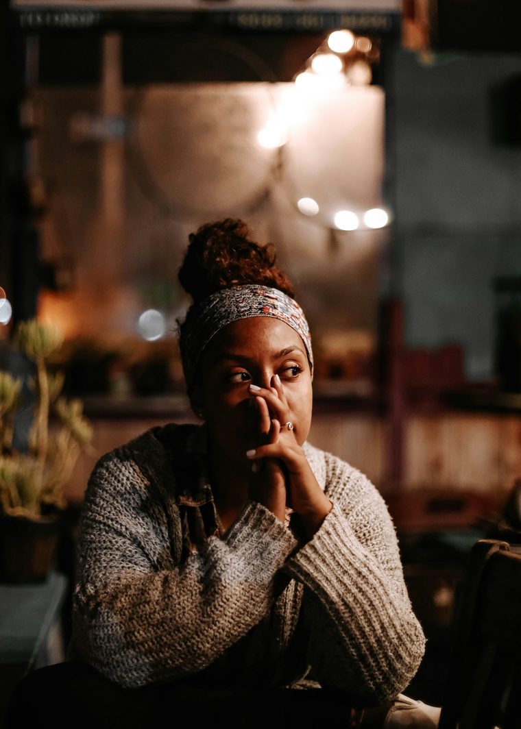 A person taking a quiet moment to reflect