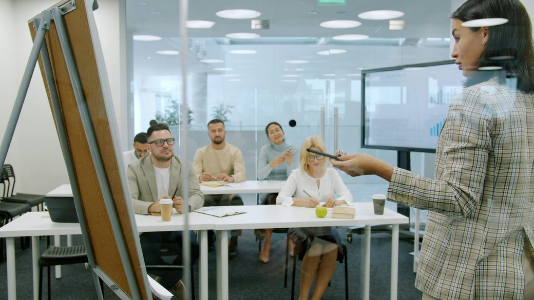 A facilitator guiding a small SMART Recovery group